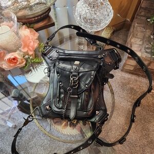 Sleek Black Crossbody Bag with Chain Accent